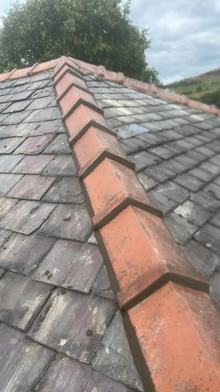 Mr Roofer UK new ridge tiles and slate replacements